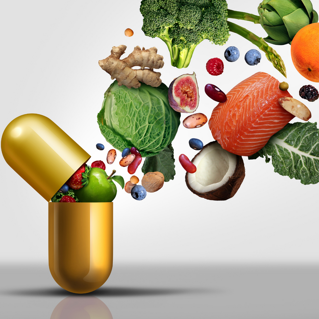 Health foods bursting out of a pill capsule. Some of these plant-based foods include cabbage, coconut and broccoli. 